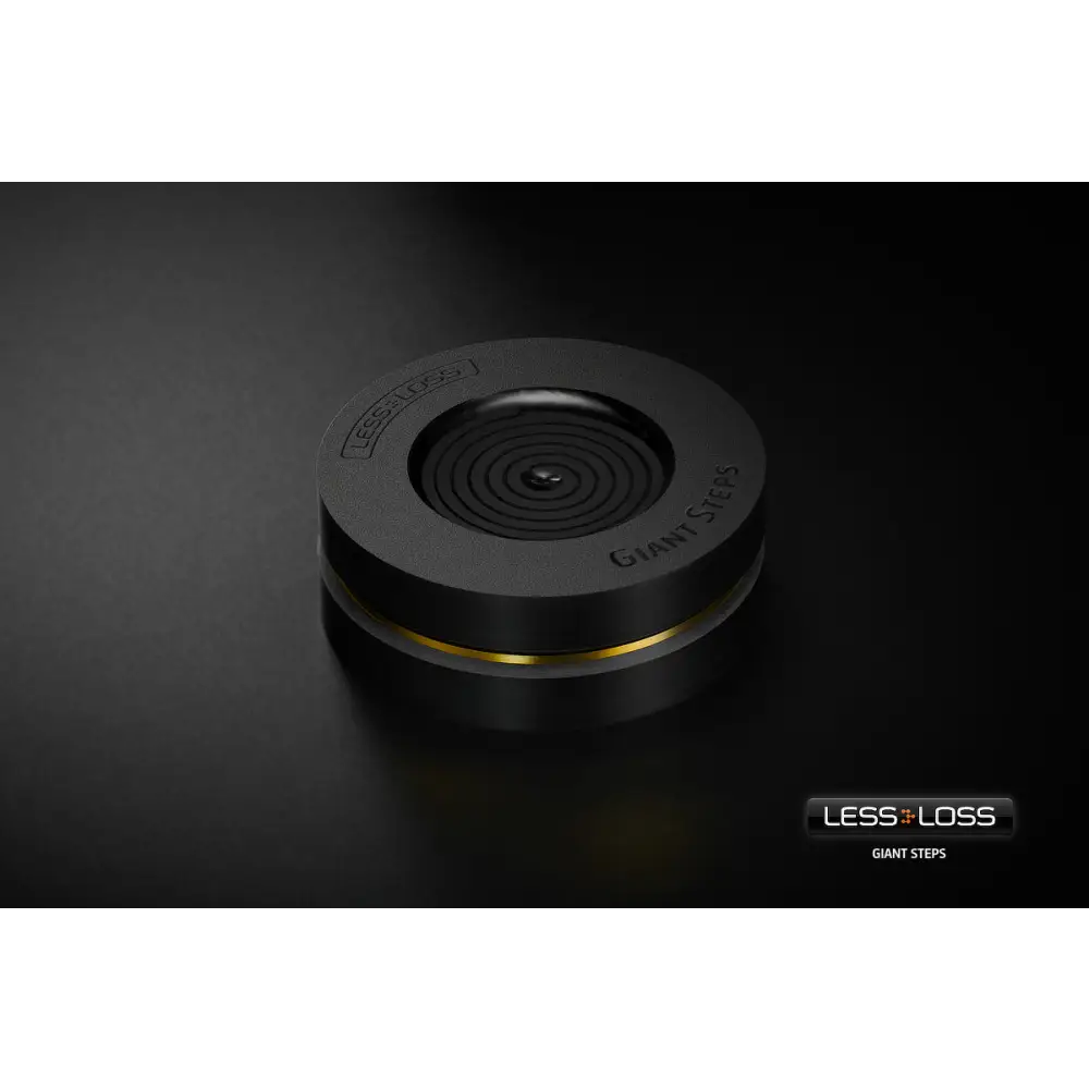 Schwarzes lessloss giant steps hifi gerät mit goldfarbenem akzent und konzentrischen rillen für optimalen signalfluss